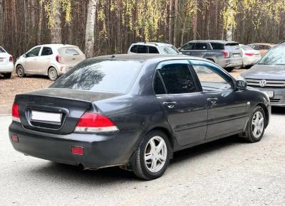 Фото Mitsubishi Lancer