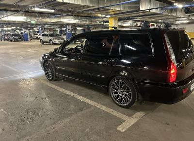 Фото Mitsubishi Lancer