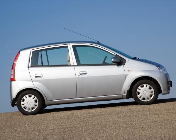 Фото Daihatsu Cuore VI (L251) Хэтчбек 5 дв.