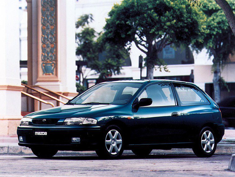 Фото Mazda 323 VI (BJ)