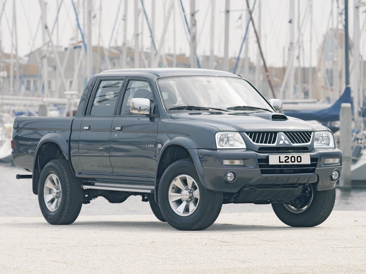 Характеристики 2.5 AT Дизель, Полный привод, Автомат, 136 л.с. Mitsubishi  L200 3 поколение Рестайлинг 2004 - 2006, Пикап Двойная кабина