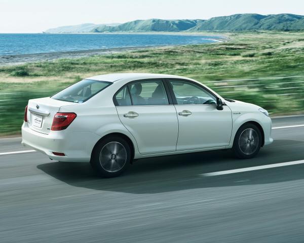 Фото Toyota Corolla XI (E160, E170) Рестайлинг 2 Седан Axio